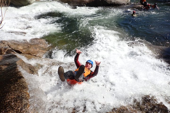 a man riding a wave on a surfboard in the water