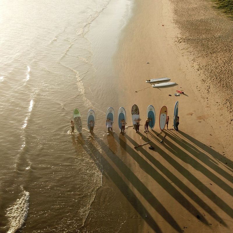 a group of people walking in the rain
