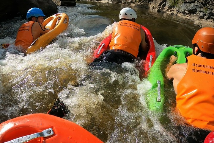 a person in a raft on the water